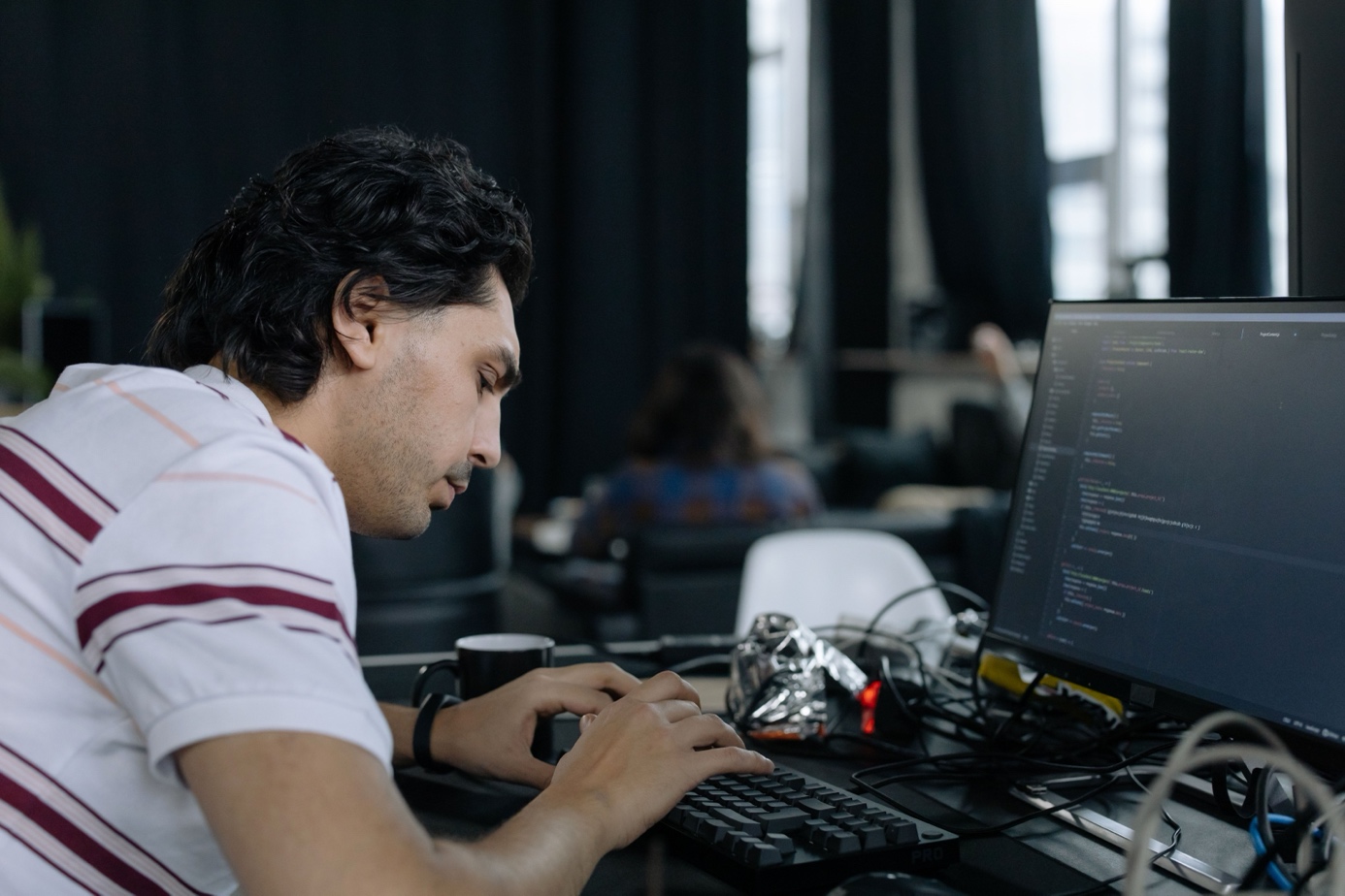 An engineer deep in code